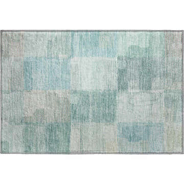 Close-up of Dalyn Luxury Ravenna RN10 Teal Washable Area Rug. Aqua, ivory, taupe, and teal patchwork design.
