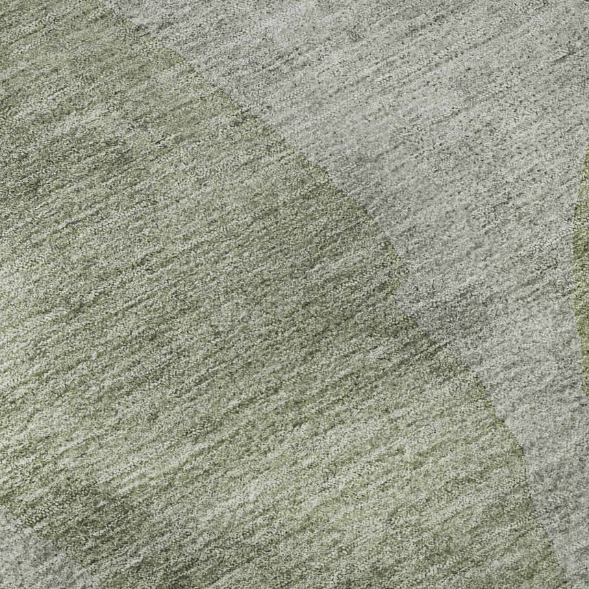 Close-up of the Dalyn Luxury Ravenna RN12 Fern Washable Area Rug, showing the aloe, green, and taupe textures.