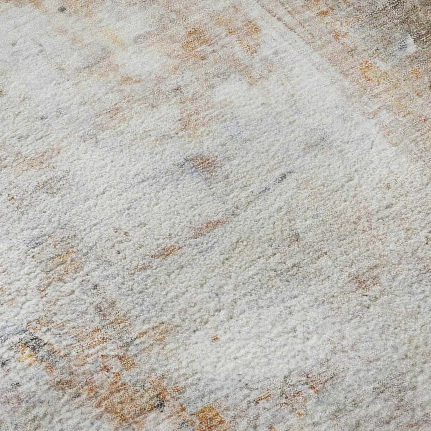 Close-up of the Dalyn Luxury Ravenna RN1 Copper Washable Area Rug, showing caramel, paprika, and silver gray tones.
