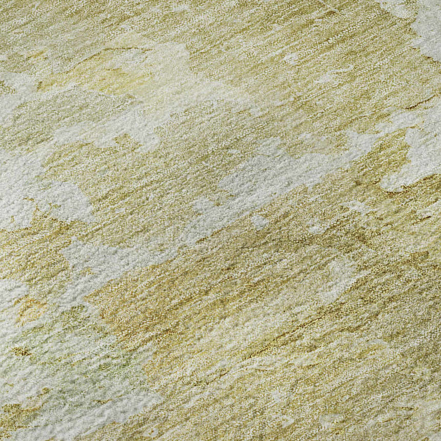 Close-up of Dalyn Luxury Ravenna RN3 Gold Washable Area Rug showing gold, green, and white textured pattern.