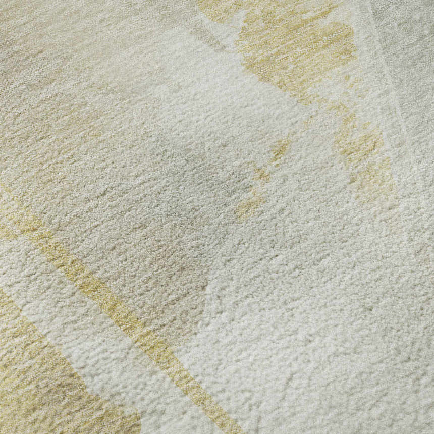 Close up of the plush texture and beige pattern on the Dalyn Ravenna RN7 Washable Area Rug.