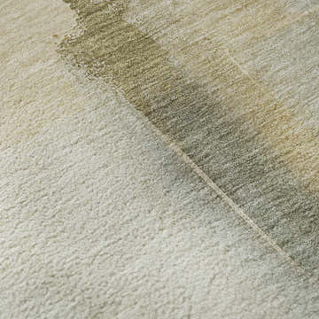 Close-up of the Dalyn Luxury Ravenna RN9 Putty Washable Area Rug, showing beige, olive, and chestnut tones.