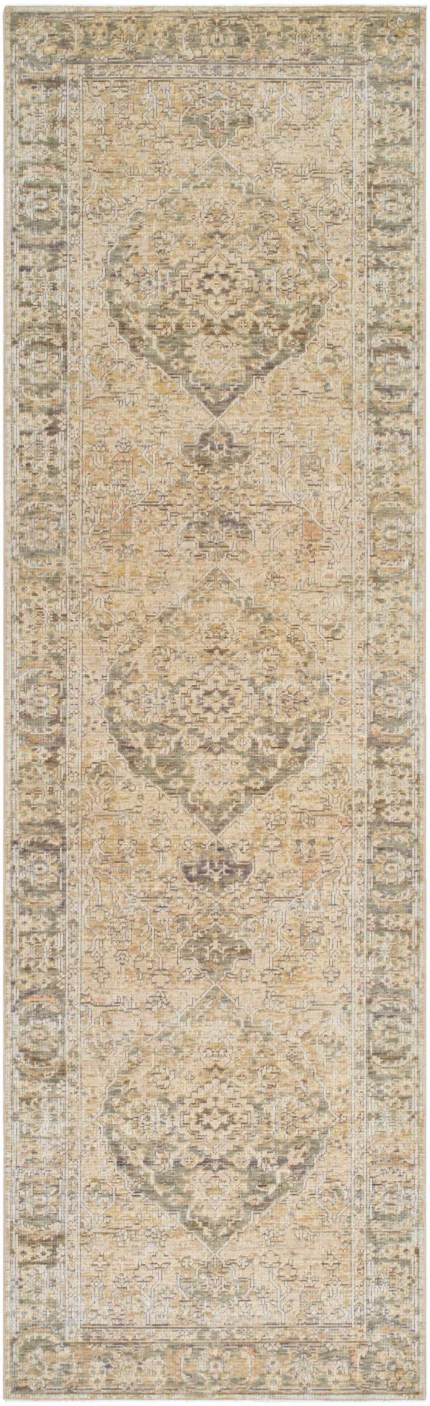 Close-up of the Becki Beige Owens x Livabliss Renaissance Area Rug. Features a traditional, farmhouse design with beige, brown, and tan tones. Design-Runner