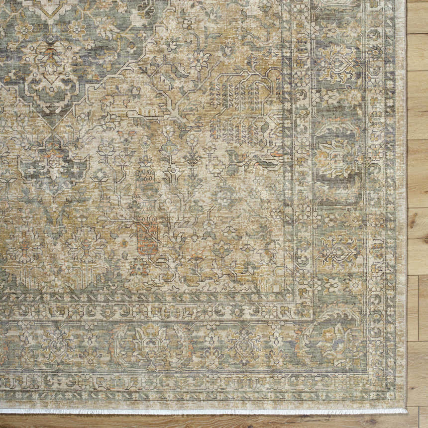 Close-up of the beige, tan, and brown floral pattern on the Becki Beige Owens x Livabliss Renaissance Area Rug. Corner