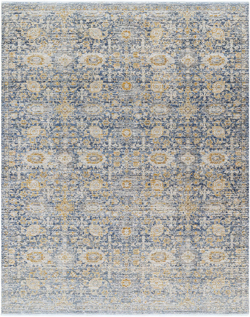 Close-up of Ren Outdoor Becki Owens x LIVABLISS BOMG-2300 rug. Machine woven with charcoal, gray, brown, navy, and taupe floral pattern. Design-Rectangle-71010