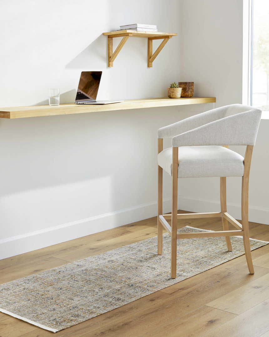 Home office with Becki Owens x LIVABLISS Ren rug runner in blue, red, gray, and brown under a chair and desk. Roomscene-Runner