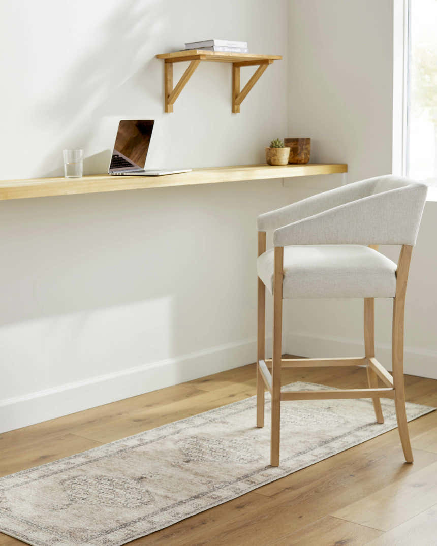 Home office with Becki Owens x LIVABLISS Lila runner rug, wood floors, white walls, and light wood desk and chair. Roomscene-Runner