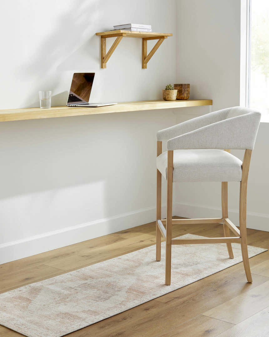 Home office with Becki Owens x LIVABLISS BONC-2301 Luca runner rug in dark red, dusty pink, and ivory under a light wood chair. Roomscene-Runner