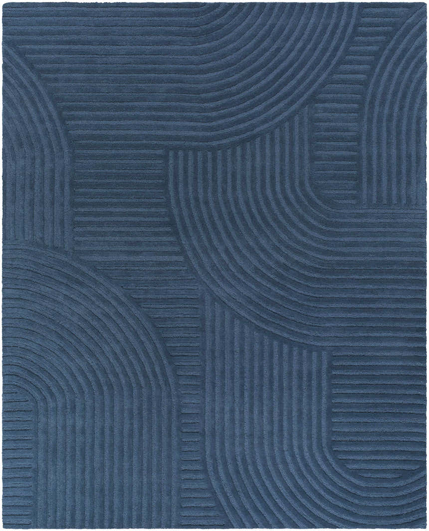 Close-up of the hand-tufted Whan Denim Area Rug, featuring a contemporary geometric pattern in shades of blue. Design-Rectangle-810