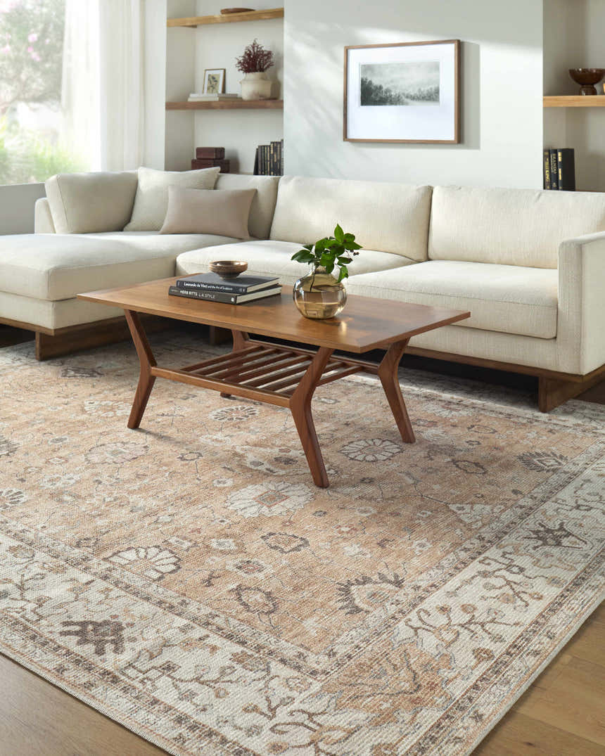Living room with a cream sectional sofa and Davina Becki Owens x LIVABLISS rug in cream, brown, and red tones. Roomscene-Rectangle