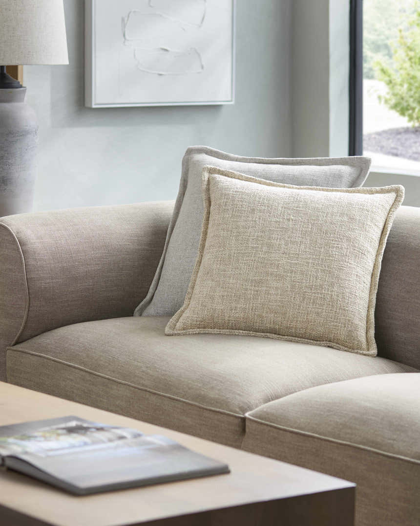 Jimbo Cream Throw Pillow