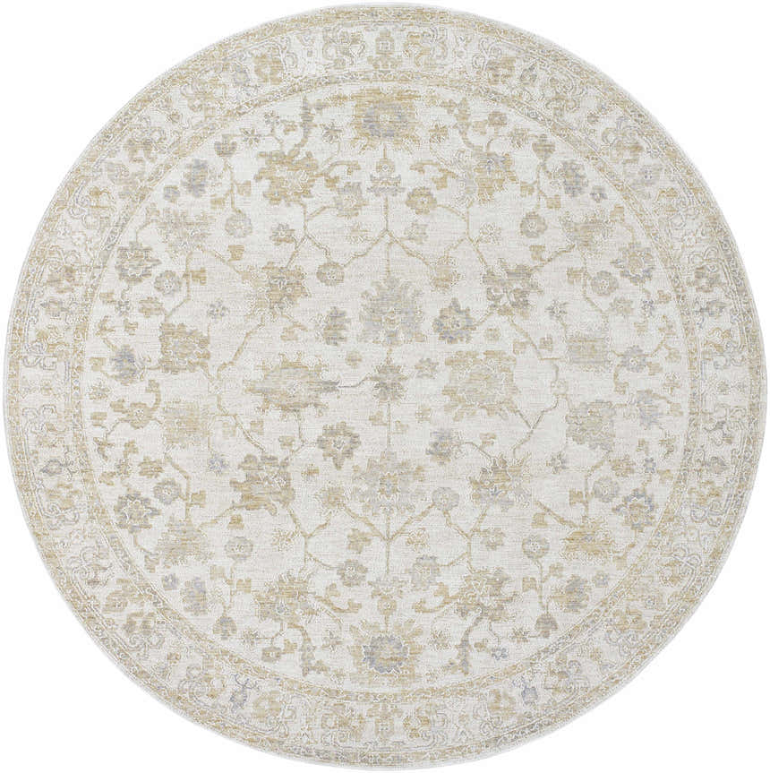 Close-up of the round Sashi Tan Luxe Area Rug, featuring a traditional floral pattern in tan, ash, and light silver. Design-Round-7