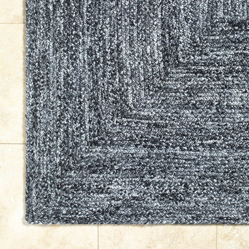 Kenyi Black Area Rug - Clearance
