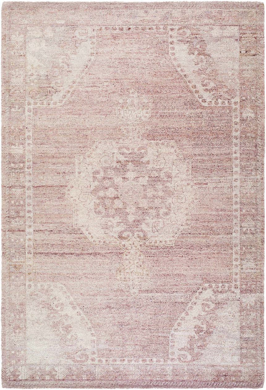 Close-up of the Alafin Area Rug. Hand-tufted polyester rug in blush, cream, dusty rose, and mauve with a traditional design. Design-Rectangle-576