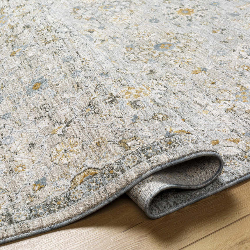 Close-up of the textured Annie Green Rug showing its farmhouse design, cotton material, and woven construction. Fold