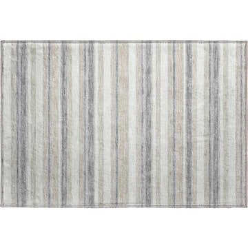 Dalyn Luxury Soft Essentials Silver Washable Area Rug with gray, beige and white vertical stripes.