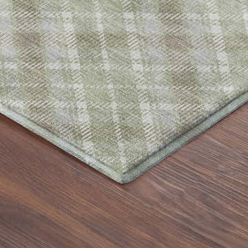Close-up of the Dalyn Luxury Soft Essentials SE3 Celery Washable Area Rug, showing the celery and white plaid pattern.