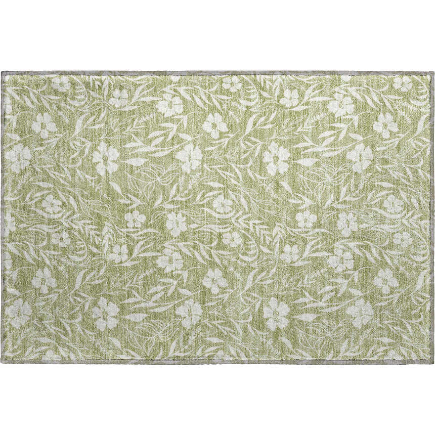 Close-up of Dalyn Luxury Soft Essentials Aloe Washable Area Rug. Green rug with white floral and leaf pattern.