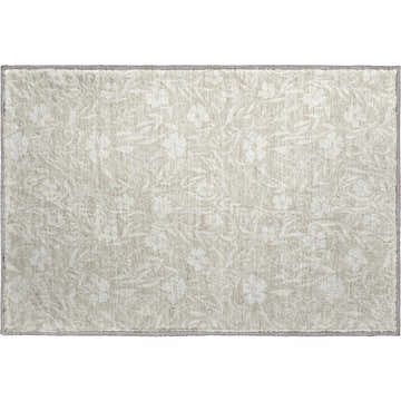 Close-up of Dalyn Luxury Soft Essentials SE4 Beige Washable Area Rug with a subtle floral pattern and soft texture.