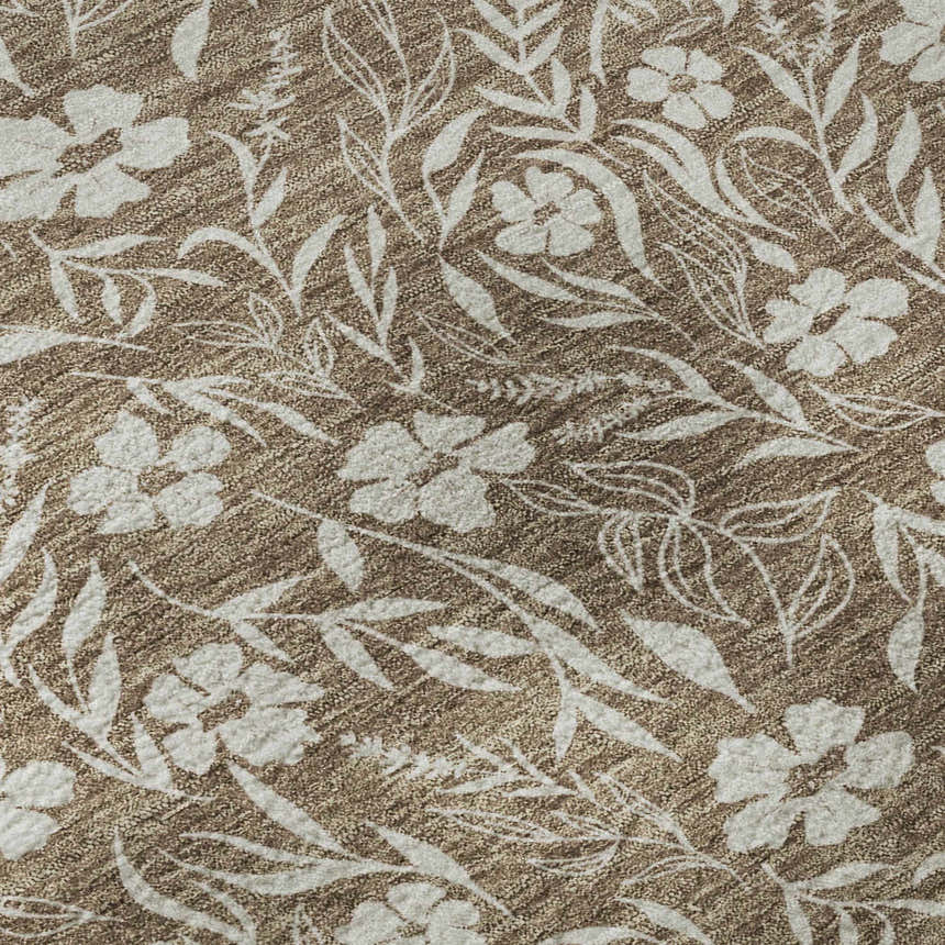 Close-up of Dalyn Luxury Soft Essentials SE4 Mocha Washable Area Rug. Light brown with a white floral and leaf pattern.