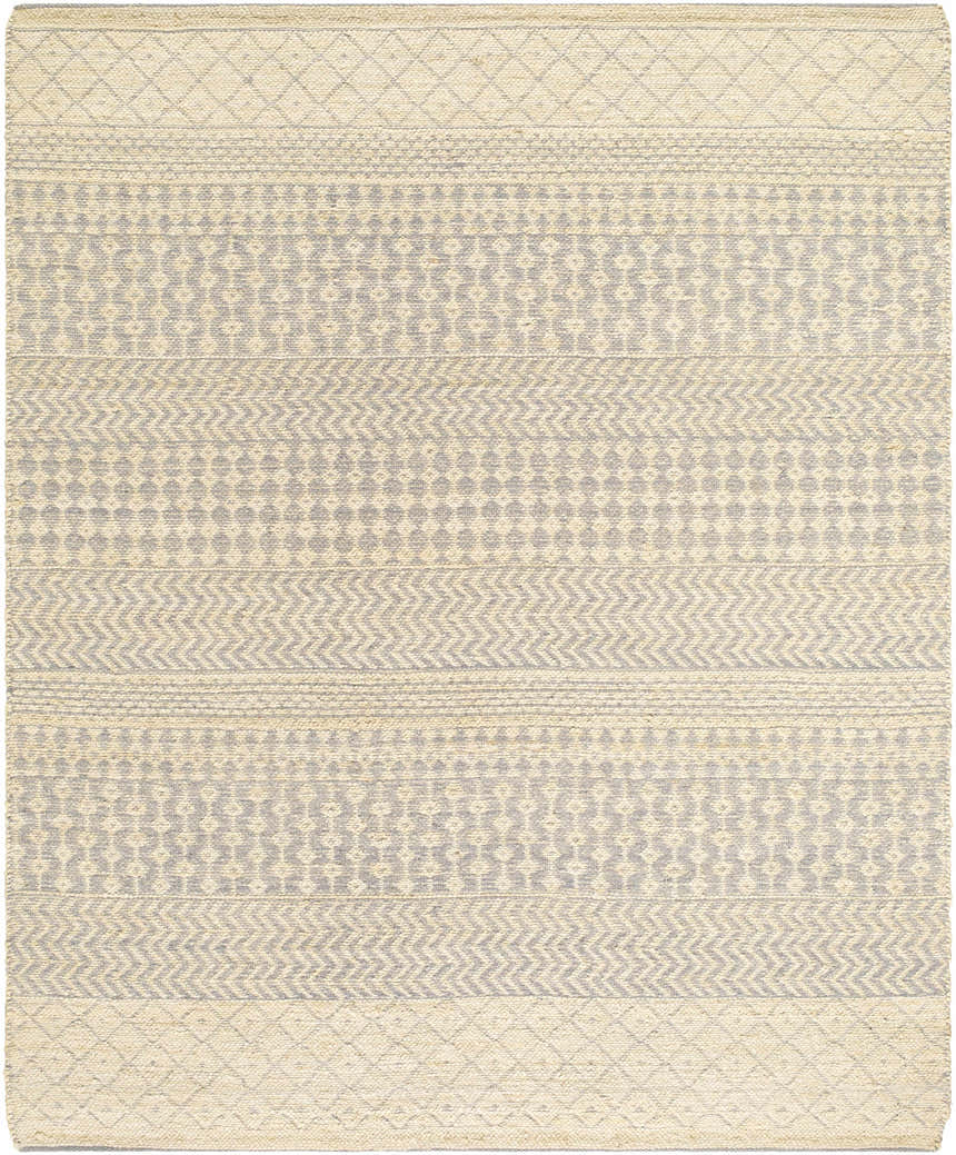 Close-up of the Inali Washable Area Rug. Farmhouse style rug in off white and gray with diamond, chevron, and geometric patterns. Design-Rectangle-810