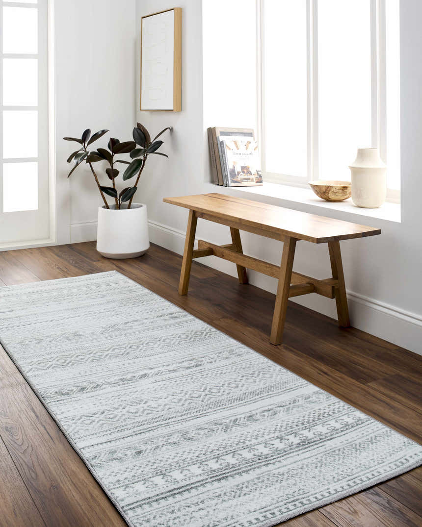Entryway with Gizeh Silverton Washable Area Rug runner, wood floors, bench, plant, and natural light. Farmhouse style. Roomscene-Runner