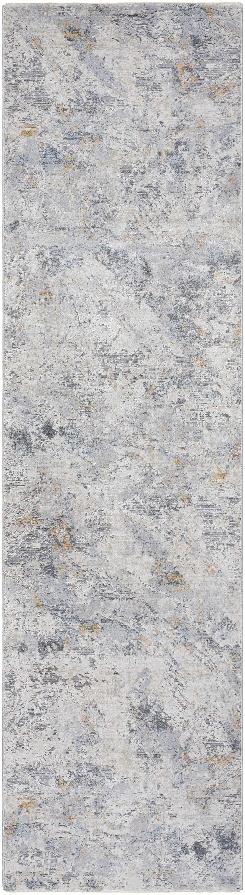 Close-up of the Amzie Area Rug, featuring a contemporary abstract design in cloud gray, dark gray, and nutmeg hues. Design-Runner-2710