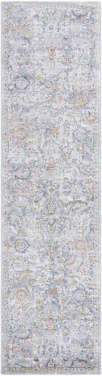 Close-up of the Atara Area Rug featuring a traditional design in cloud gray, light gray, and nutmeg colors. Design-Runner-2710