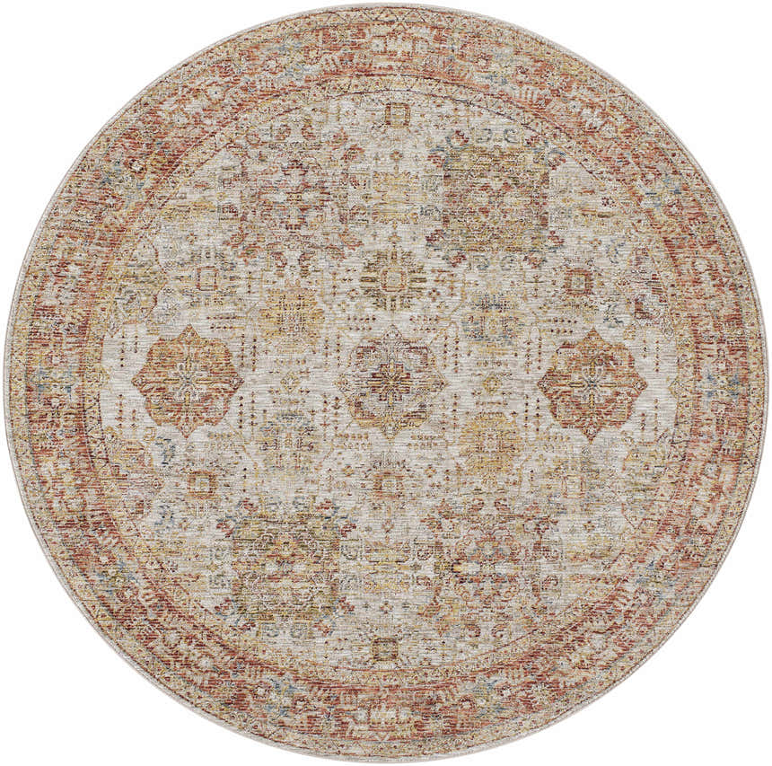 Close-up of a round Ange Rust rug. Rich texture, traditional pattern, bone, rust, and gray coloring. Design-Round-67
