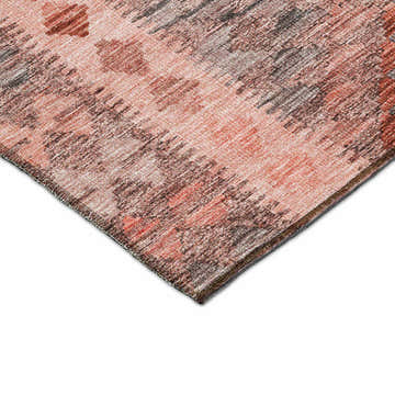 Close-up of Dalyn Luxury Solace SL13 Terracotta Washable Area Rug. Abstract design in blush pink, burnt orange, and taupe.