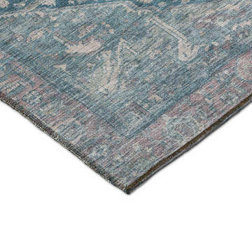 Close-up of the blue Dalyn Luxury Solace SL14 rug. Features beige, denim, and taupe traditional farmhouse patterns.
