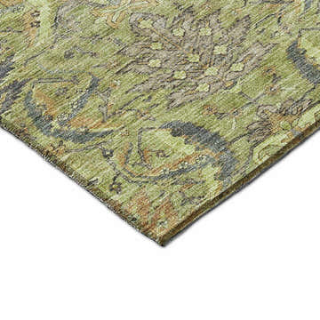 Close-up of the Dalyn Luxury Solace SL7 Aloe Washable Area Rug. Features aloe, caramel, green, and ivory colors.