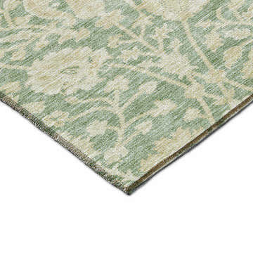 Close-up of the Dalyn Luxury Solace SL8 Aloe Washable Area Rug, featuring a green and beige farmhouse-style pattern.