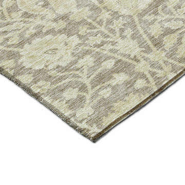 Close-up of the beige and light brown floral pattern on the Dalyn Solace Mocha Washable Area Rug.