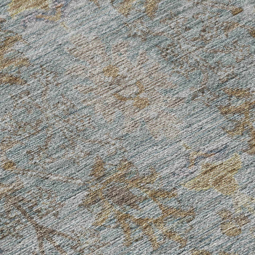 Close-up of the Dalyn Luxury Solace SL9 Teal Washable Area Rug. Features a teal, beige, and brown traditional pattern.
