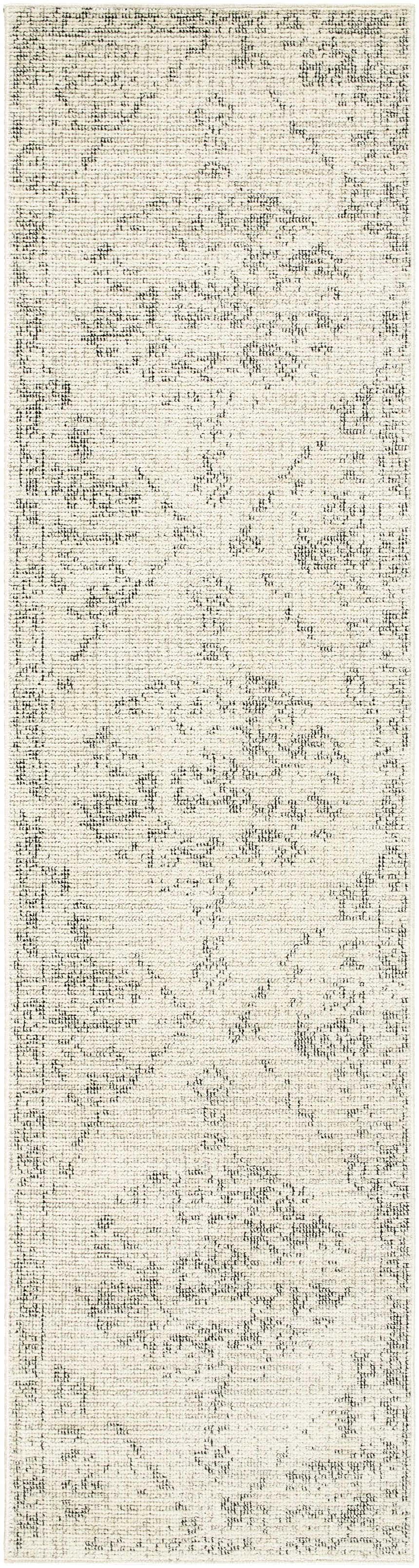 Close-up of the Tait Area Rug in bone and cloud gray, showcasing its traditional, farmhouse-style pattern and machine-woven texture. Design-Runner-2710