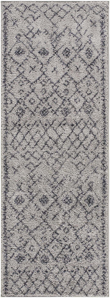 Close-up of the Elyes Gray Washable Area Rug. Shag rug with a gray and dark gray geometric diamond pattern. Soft texture. Design-Runner-2773