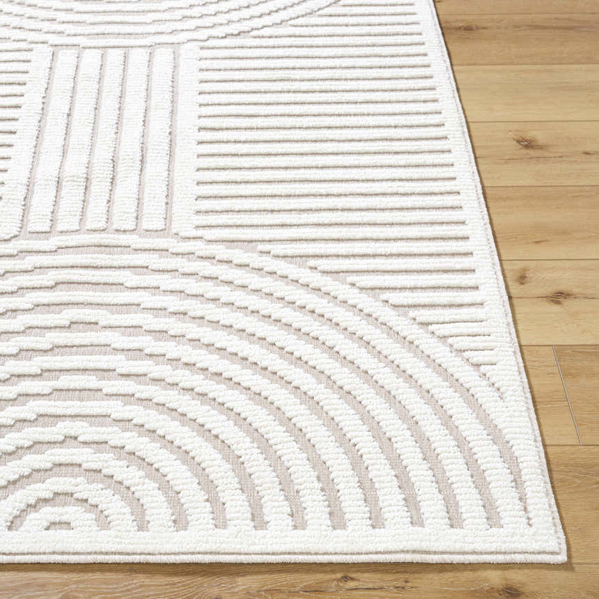 Close up of the Deron Ivory 3D Rainbow Washable Rug featuring a geometric pattern and soft texture. Front
