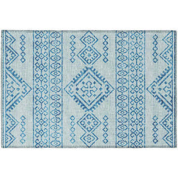 Close-up of the Dalyn Sedona SN14 Sky Washable Area Rug. Features a geometric pattern in denim, light, and sky blue hues.
