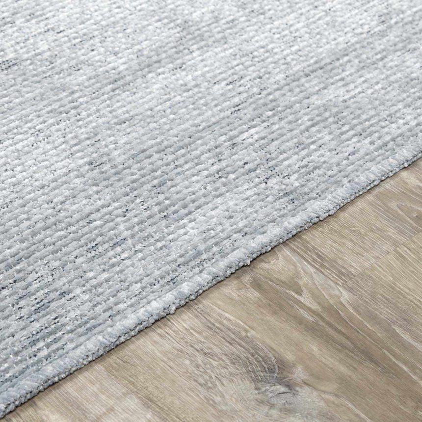 Isako Blue & Gray Solid Washable Area Rug - Clearance
