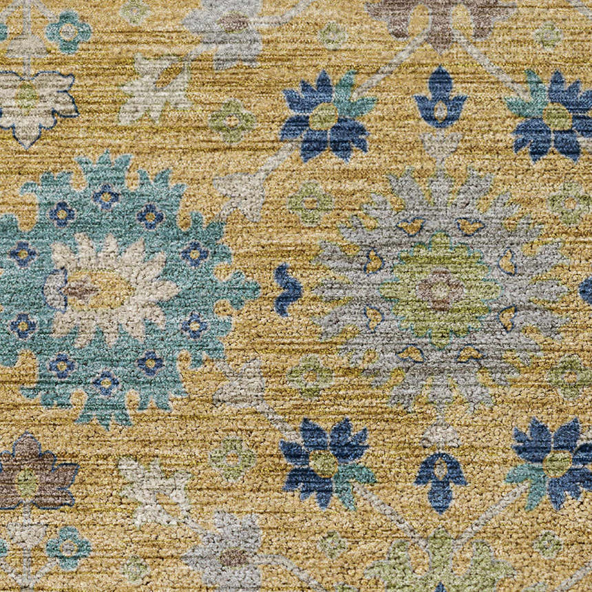 Close-up of the Dalyn Indoor/Outdoor Silk Road SR3 Turmeric Area Rug. Features a floral pattern in turmeric, blue, ivory, and green.