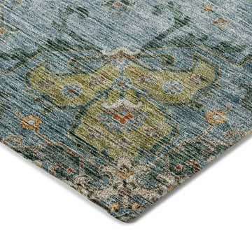 Close-up of the Dalyn Indoor/Outdoor Silk Road SR6 Aqua Area Rug. Features traditional floral patterns in aqua, aloe, and gold.