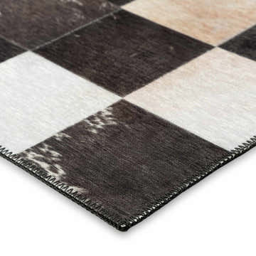 Close-up of the Dalyn Durango SS10 Midnight Washable Area Rug, showing a beige, black, and white checkerboard pattern.