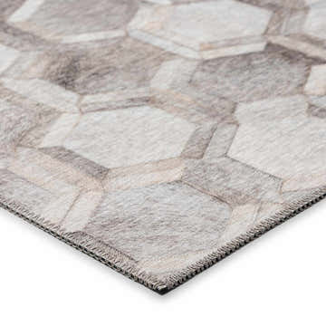 Close-up of the beige and black Dalyn Durango Flannel Washable Area Rug with a geometric, hexagon pattern.