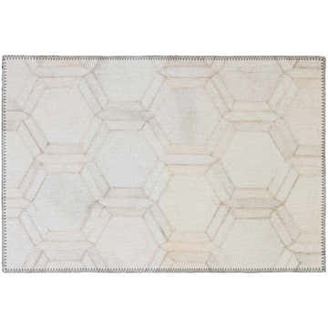 Close-up of the Dalyn Durango SS1 Linen Washable Area Rug. Beige rug with a geometric hexagon pattern and a textured look.