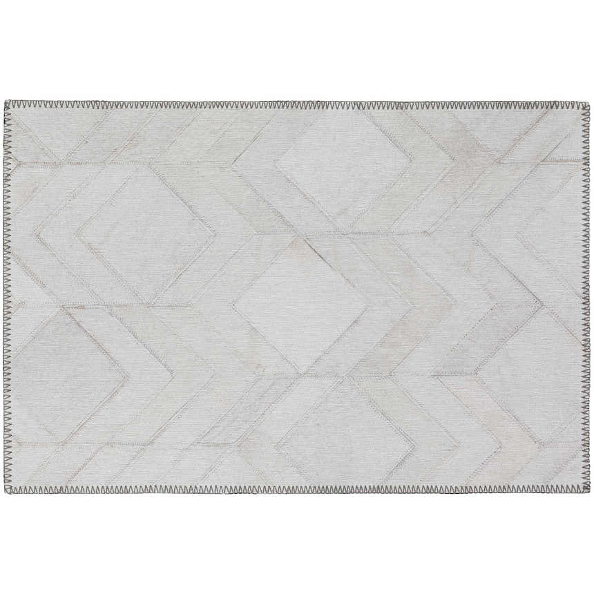 Close-up of a Dalyn Durango SS5 Linen Washable Area Rug. Beige rug with geometric diamond pattern and textured look.