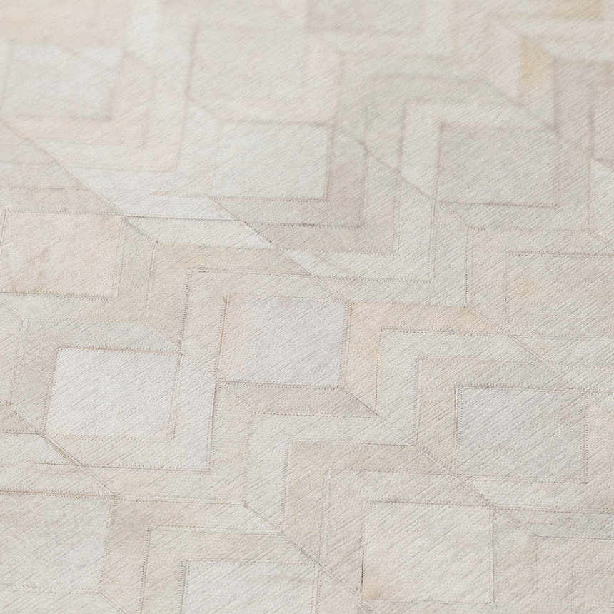 Close-up of the Dalyn Durango SS5 Linen Washable Area Rug. Beige, taupe, and chestnut geometric pattern. Machine-made texture.