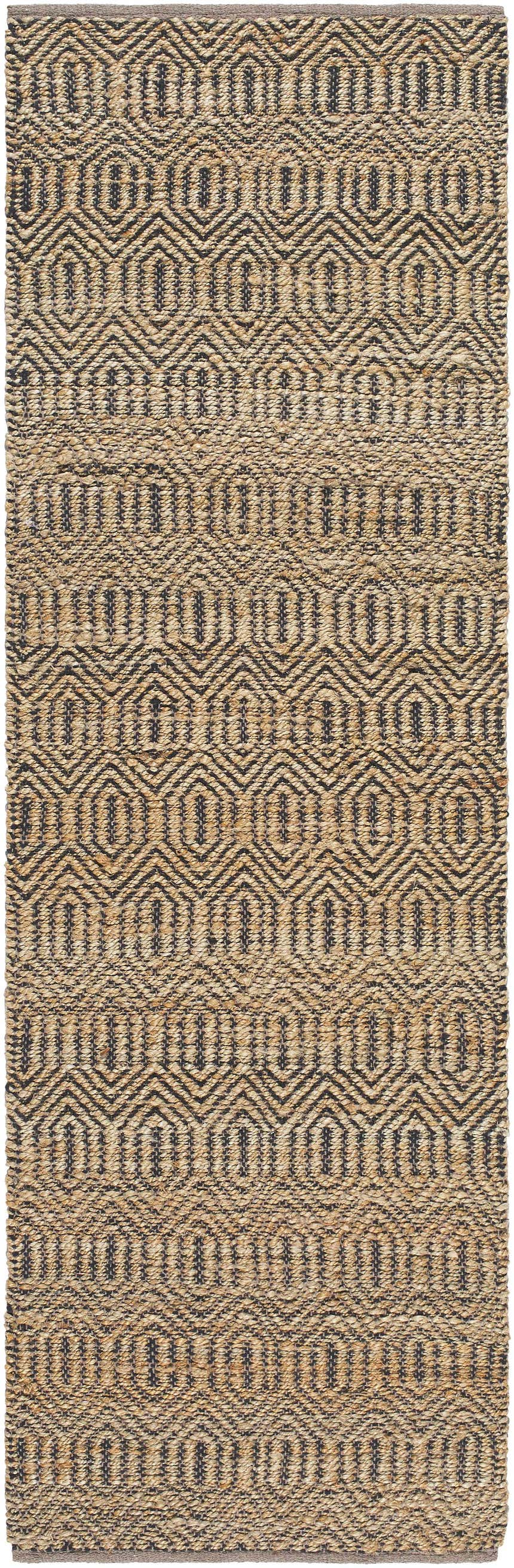 Close-up of the Hetty Area Rug. Hand-woven jute and cotton rug with a geometric pattern in camel and chocolate brown. Design-Runner-268