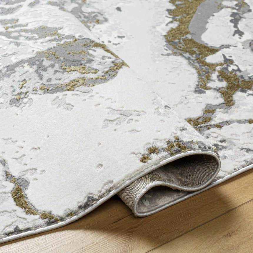 Close-up of the Kaleo Gray & Green Marble Area Rug showing its abstract pattern and soft, plush texture. Fold