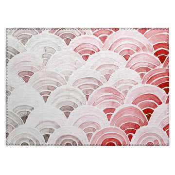 Dalyn Seabreeze Scarlett Washable Area Rug close-up. Coastal style rug with red, pink, and taupe scallop pattern.
